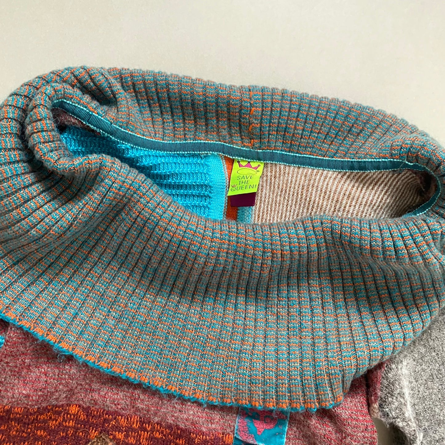 Save the Queen roll neck jumper