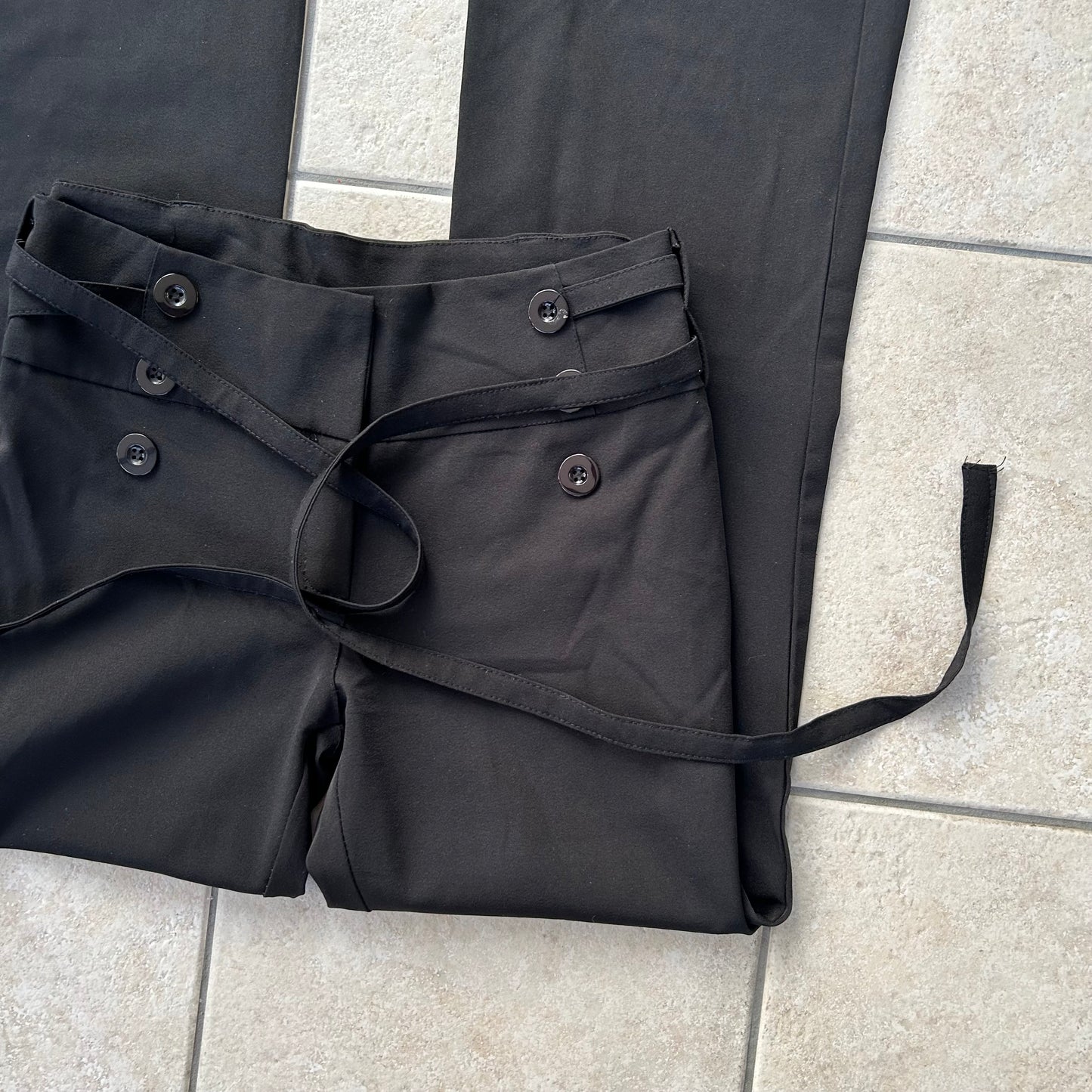 Black stetch button up trousers